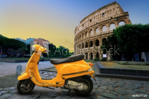 Picture of Yellow vintage scooter on the background of Coliseum